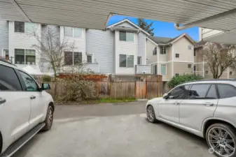 Designated parking spot off alley behind townhomes