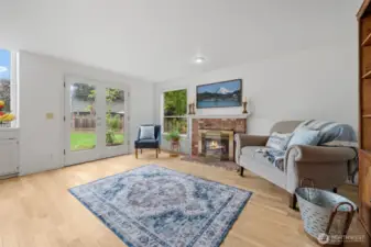 French doors lead out to the spacious backyard