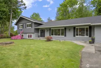 Expansive tri-level floor plan with seamless flow and versatile living spaces.