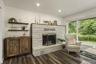 Bright and spacious dining room with built-in bar and large windows creating an inviting atmosphere.