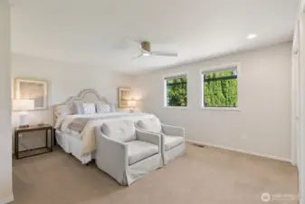 Step into your spacious main floor primary suite—where comfort meets elegance, complete w/ serene views & a relaxing atmosphere that feels like your own private escape