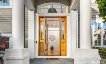 Elegant covered entry.