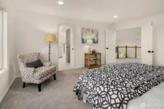 Double doors lead to primary suite on the upper level.
