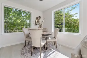 Spacious dining area seamlessly connected to the kitchen and living room