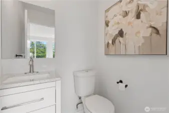 Main-level half bath for guest convenience
