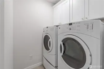 Well-sized laundry room on the lower level with updated finishes