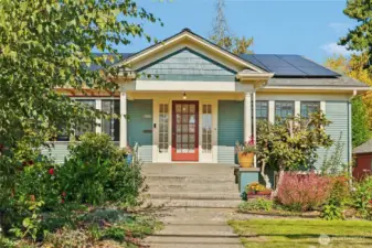 Current owners removed the faux siding and found the original pristine cedar siding underneath which they restored.