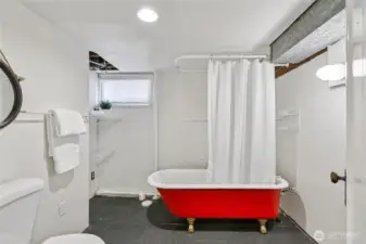 Basement bathroom with clawfoot tub.