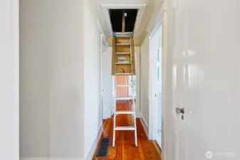 Pull down ladder for easy access to attic.