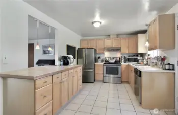 Kitchen has tons of storage and room for more then one cook. Window over sink looks out to large backyard.