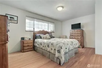 Primary bedroom that has plenty of room. Virtually staged, does not reflect owners personal belongings and furniture.