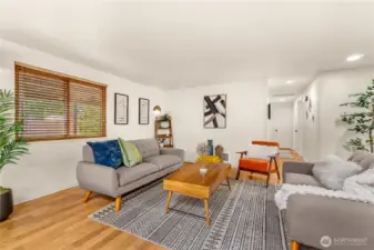 Big sunny living room is even larger than it seems here.