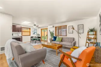 a view toward the kitchen and dining areas