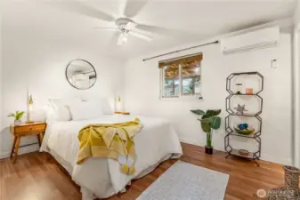 Big primary bedroom easily fits a king size bed