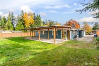 Fully fenced backyard is perfect for play time