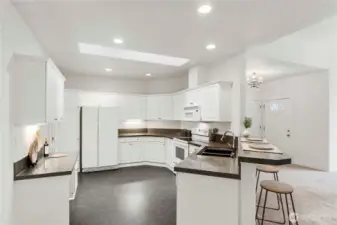 Bar seating and a ton of storage in the kitchen