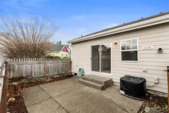 Private yard with A/C unit