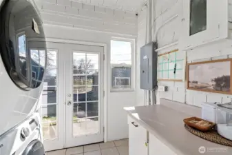 High Functioning space - laundry, mudroom and with all of those windows we can even call it a "sunroom".