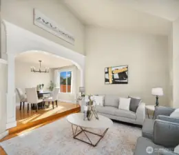 View from entry showing living room and formal dining area.