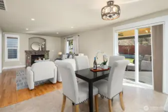 Another view of informal dining, family room, and deck