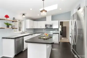Kitchen looking into bonus room