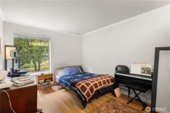 The adjacent second bedroom.