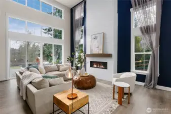 The living room of your dreams! With a gas fireplace, 20' ceilings and floor to ceiling windows, this room was made for relaxation and enjoyment.