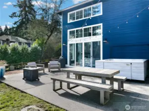 Enjoy a soak in your hot tub on the back patio. A seamless extension from the living room, with plenty of space for entertaining.