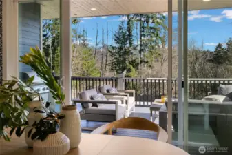 The dining room offers indoor outdoor living, with oversided sliding doors that lead to your covered deck. You'll love every part of this home all year round.