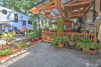 17 FIR RV site with 2 sheds, washer/dryer, covered patio on deck, pole barn cover with beautiful landscaping, 120 Gallon in ground propane tank ready to hook up to your RV