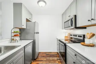Plenty of counter space and storage in the kitchen.