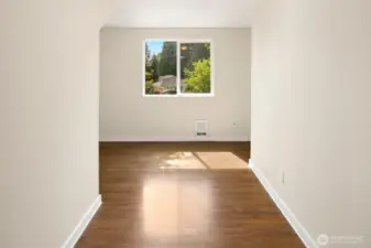 Office/den with nice territorial view, this is wider at the back wall and has a closet under the stairs. It is big enough for a twin bed so one could add a wall/door to create a 6th bedroom if needed.