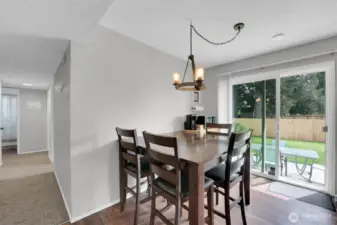 Hallway view and sliding glass door to backyard