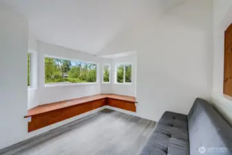 Upstairs loft can be a den or office.