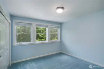 This room faces lake and large windows allow winter views of lake.