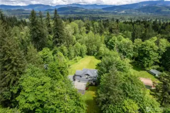 Nestled in the trees with the cascades in the background.  Very private setting.