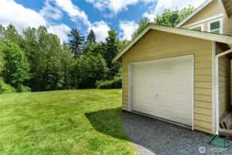 10 x 12 shed with easy access garage door.  Nearby hot/cold water taps for car and dog washing.