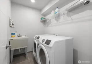 Upstairs laundry room for convenience