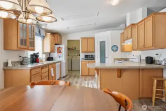 Open & bright space- lovely cabinetry - walk in pantry- fridge included.