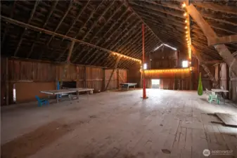 Endless options for this space, gorgeous beams and vaulted ceilings, bring your imagination!
