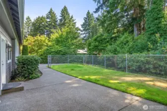 Dog run or room for additional garage space for golf cart garage