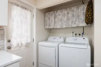 Conveniently located laundry area.