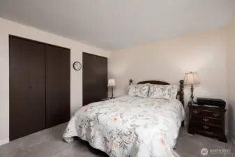 Primary bedroom features two closets.