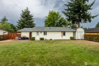 Large fenced backyard—room to play, garden, or relax