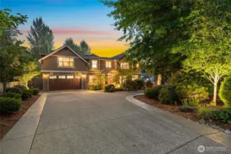 Sprawling driveway to your gorgeous custom craftsman home