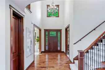 Features genuine hardwood flooring, plush new carpet, trim millwork, and crown molding throughout.