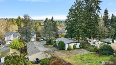 Over 21,000 sf of land, two manufactured homes complete with peek a boo Cascade Mountains view!