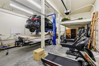 Inside the garage there is a car lift