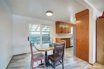 Dining area connect nicely to kitchen and out door deck that is covered.