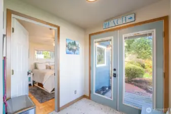Secondary bedroom separated from main suite for privacy.